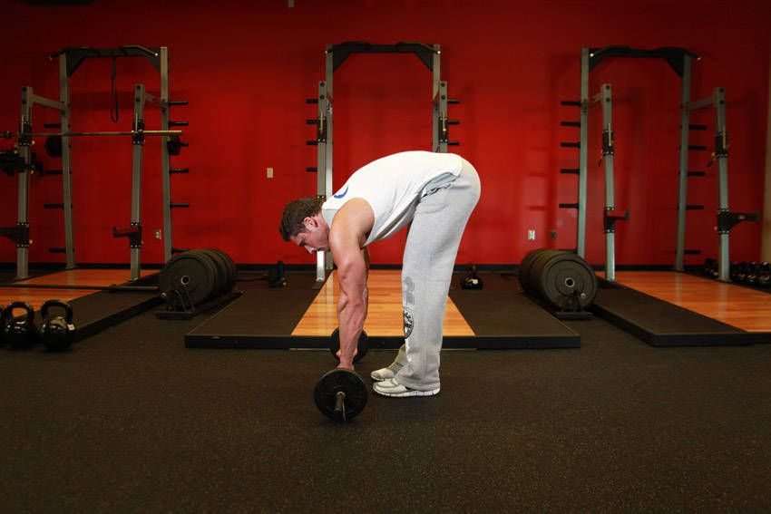 Barbell Rollout exercise demonstration, targeting the abs