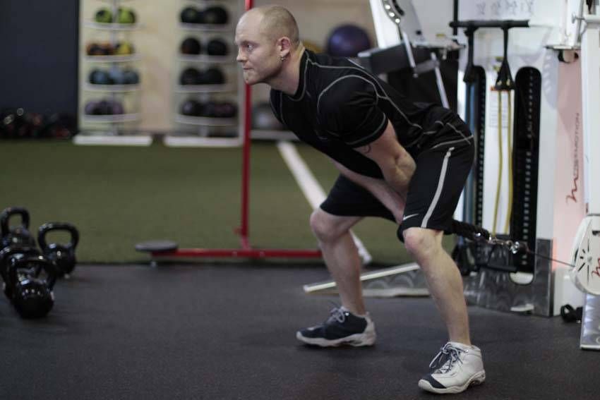 Cable Pull-Through exercise demonstration, targeting the glutes