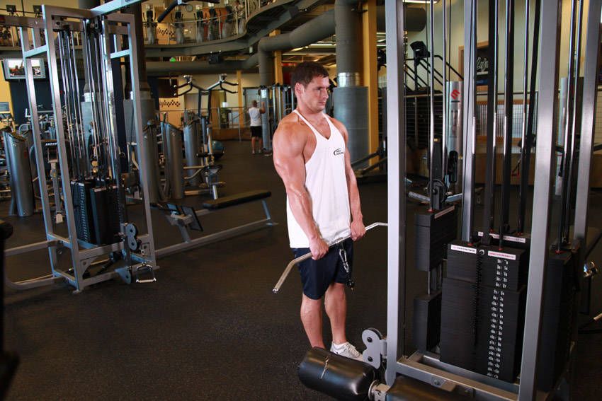 Cable Shrug exercise demonstration — targets the traps