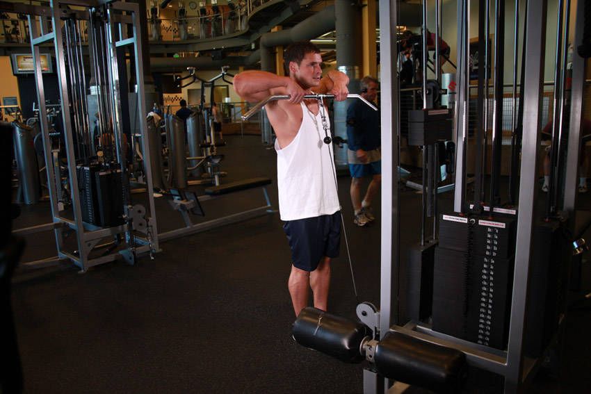 Cable Upright Row exercise demonstration, targeting the shoulders