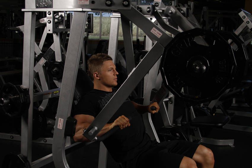 Decline Machine Chest Press exercise demonstration, targeting the chest
