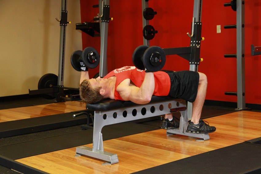 Dumbbell Bench Press exercise demonstration — targets the chest