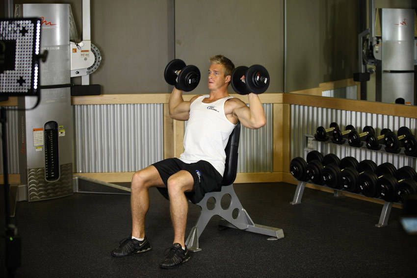 Dumbbell Overhead Press exercise demonstration, targeting the shoulders