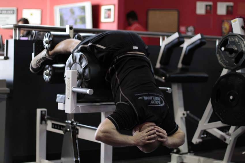 Glute-Ham Raise exercise demonstration, targeting the hamstrings