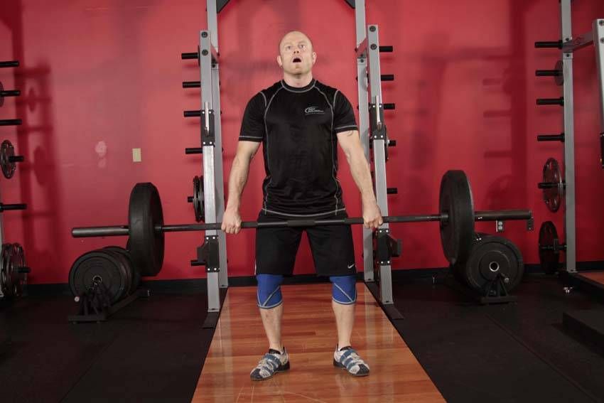 Hang Clean exercise demonstration — targets the quads