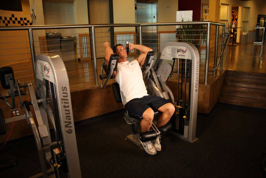 Machine Crunch exercise demonstration — targets the abs