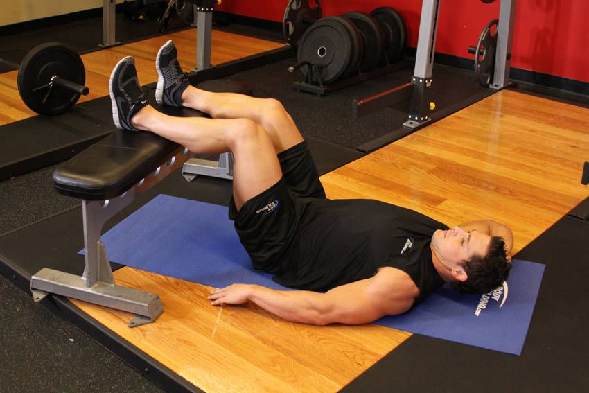 Oblique Crunch exercise demonstration — targets the obliques