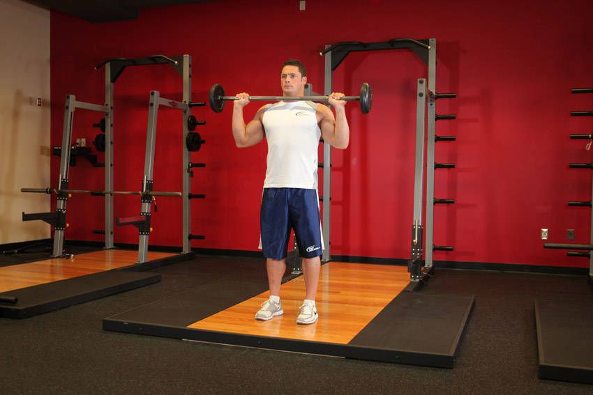 Overhead Press exercise demonstration — targets the shoulders