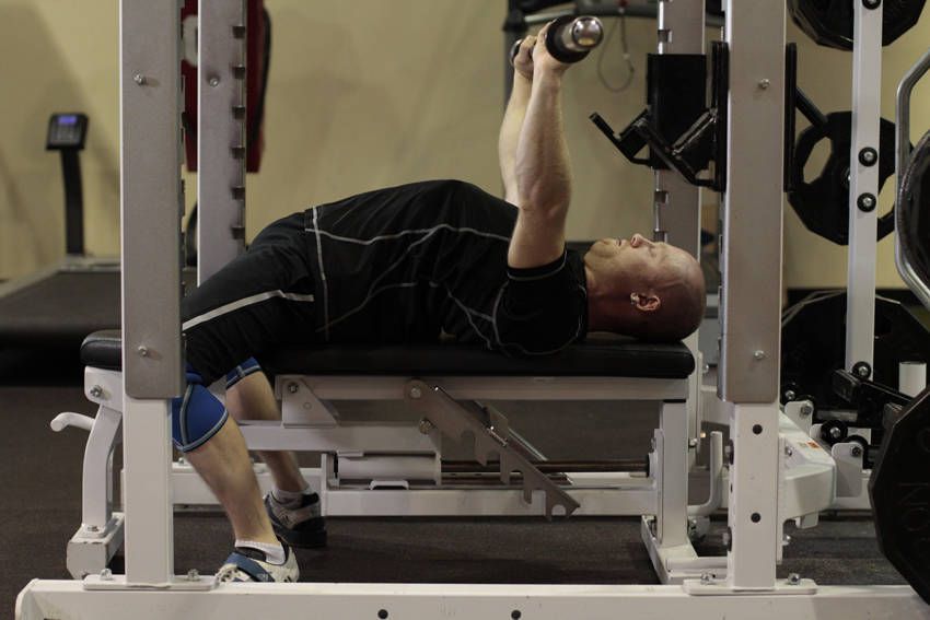 Paused Bench Press exercise demonstration, targeting the chest