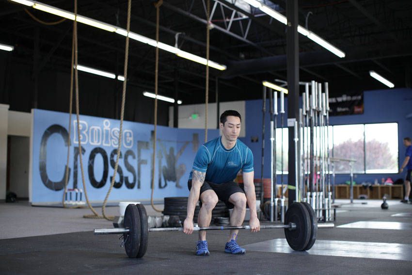 Power Clean exercise demonstration — targets the quads