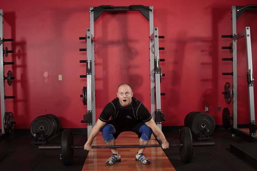 Power Snatch exercise demonstration — targets the quads