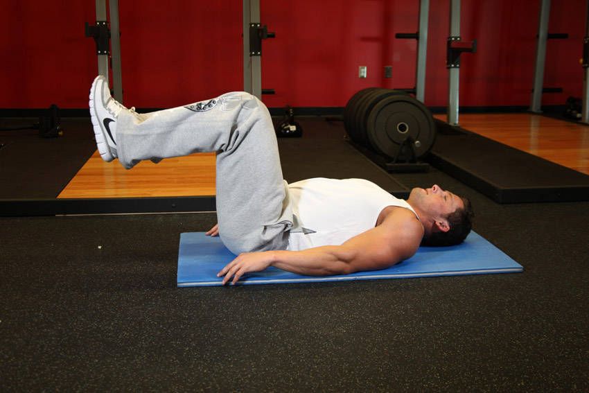 Reverse Crunch exercise demonstration, targeting the abs