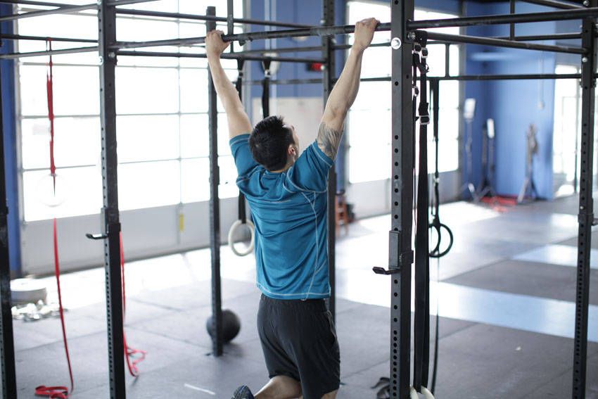 Scapular Pull-Up exercise demonstration, targeting the traps