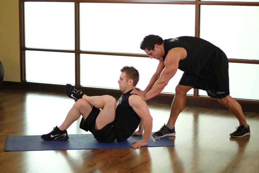 Seated Glute Stretch exercise demonstration — targets the glutes