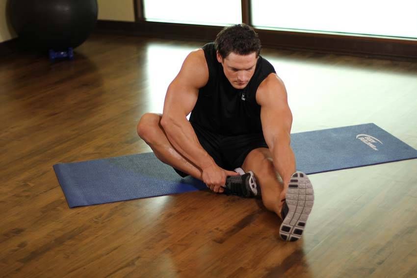 Seated Hamstring Stretch exercise demonstration, targeting the hamstrings