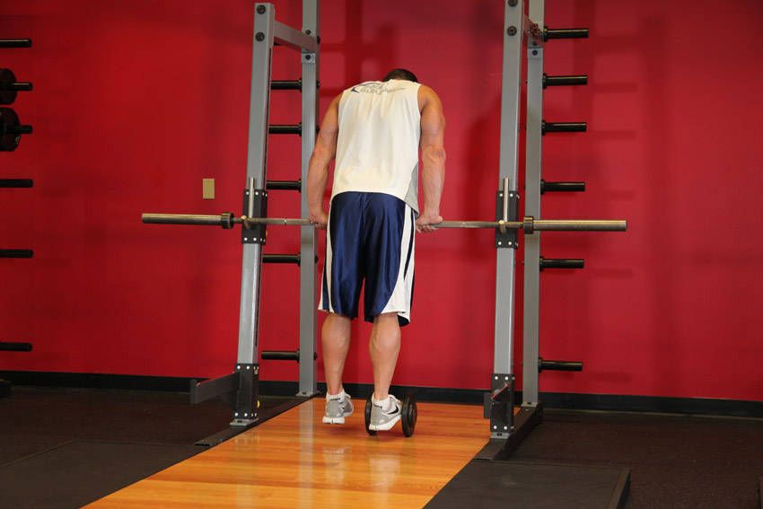 Single-Leg Dumbbell Calf Raise exercise demonstration, targeting the calves