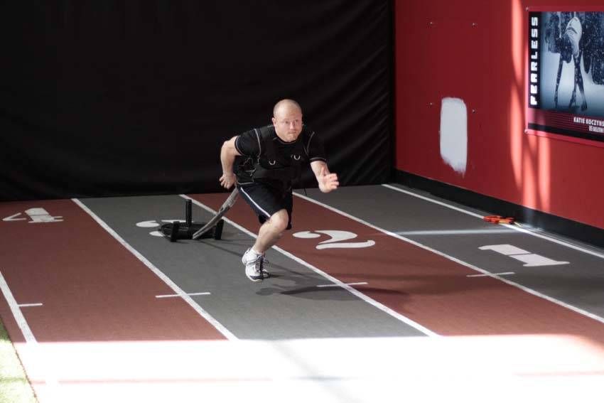 Sled Drag (Harness) exercise demonstration — targets the quads