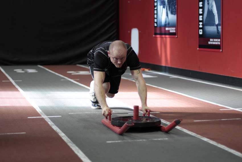 Sled Push (Prowler) exercise demonstration — targets the quads
