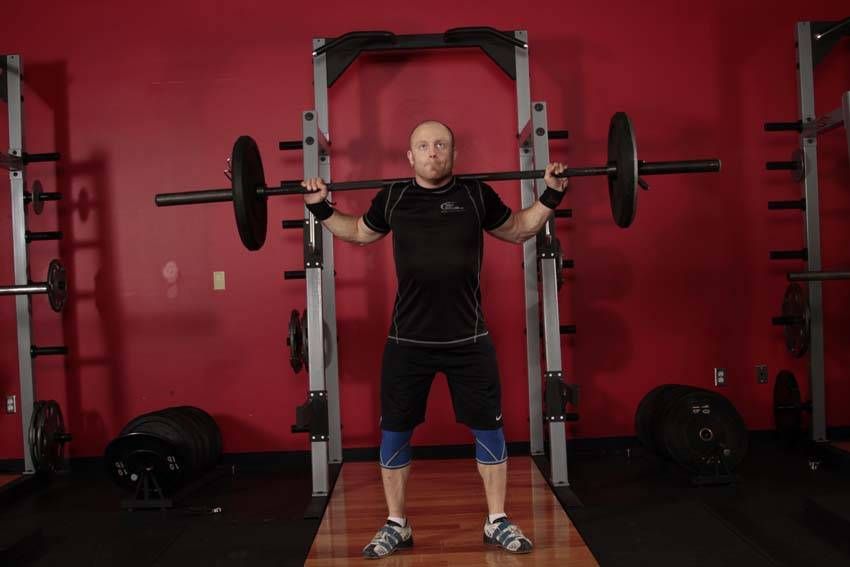 Snatch Balance exercise demonstration — targets the quads