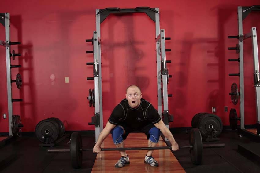 Split Snatch exercise demonstration — targets the quads