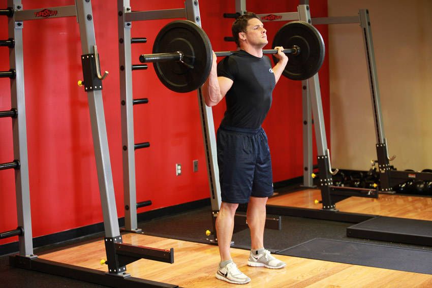 Barbell Back Squat exercise demonstration — targets the quads