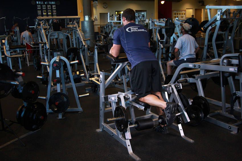 Standing Leg Curl exercise demonstration, targeting the hamstrings