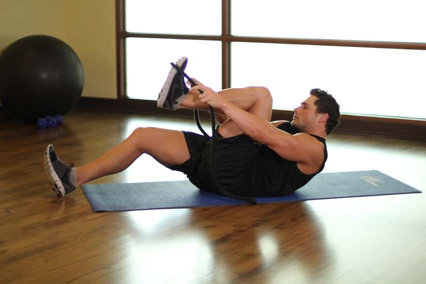 Standing Quad Stretch exercise demonstration — targets the quads