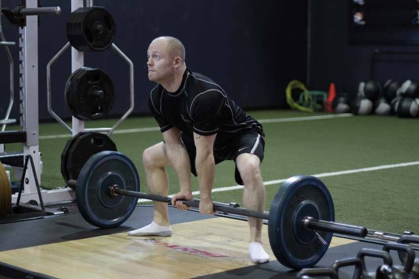Sumo Deadlift exercise demonstration, targeting the glutes